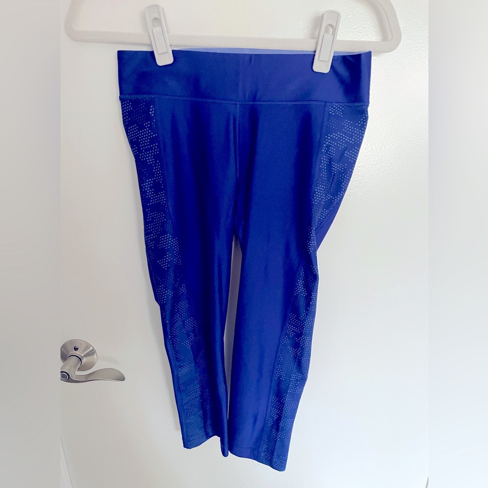Under Armour cropped workout leggings with mesh detail in blue, size medium